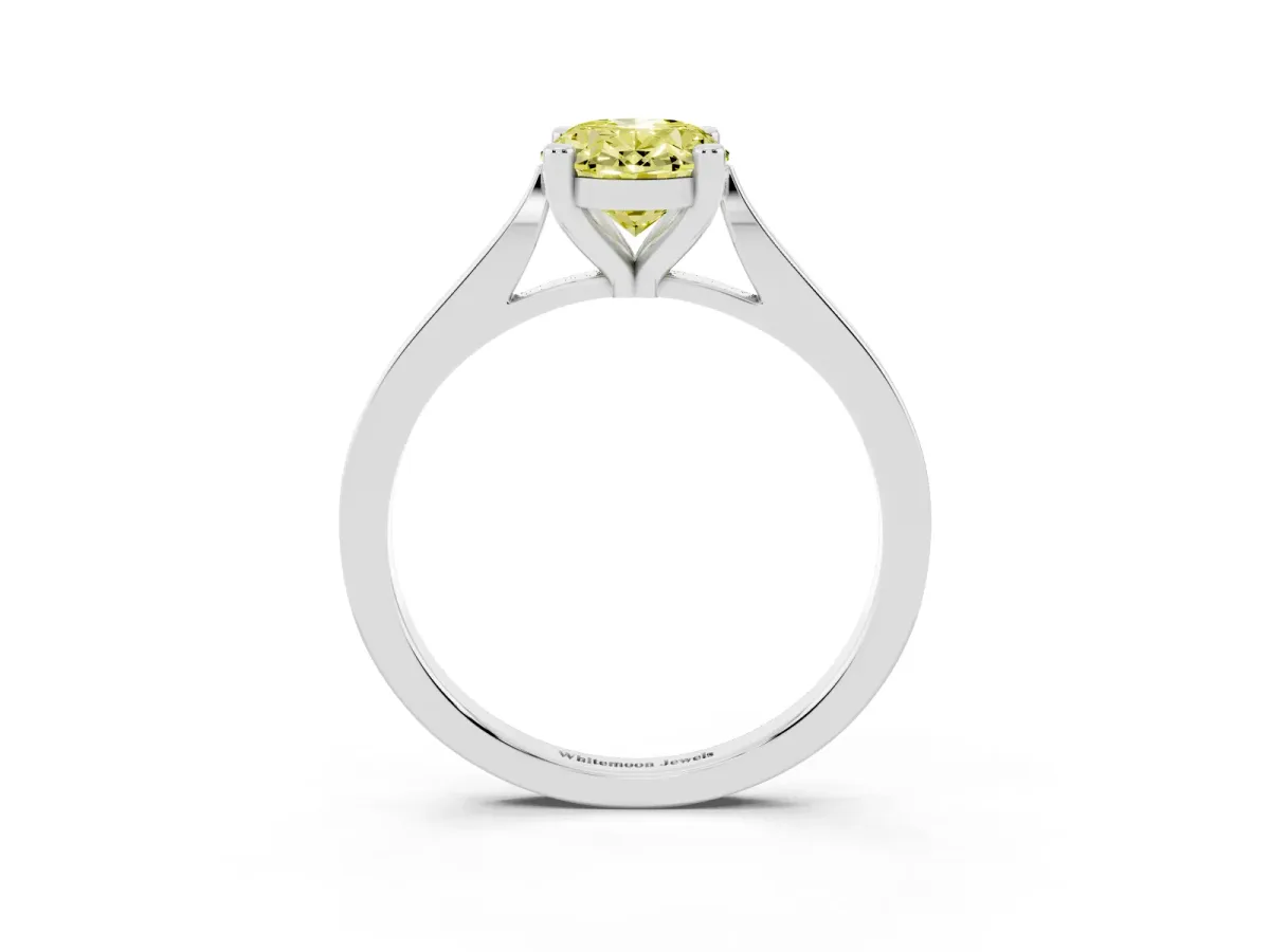 Fancy Yellow Oval Cut Solitaire Diamond Ring with Four-Prong Setting and Tapered Band Silver