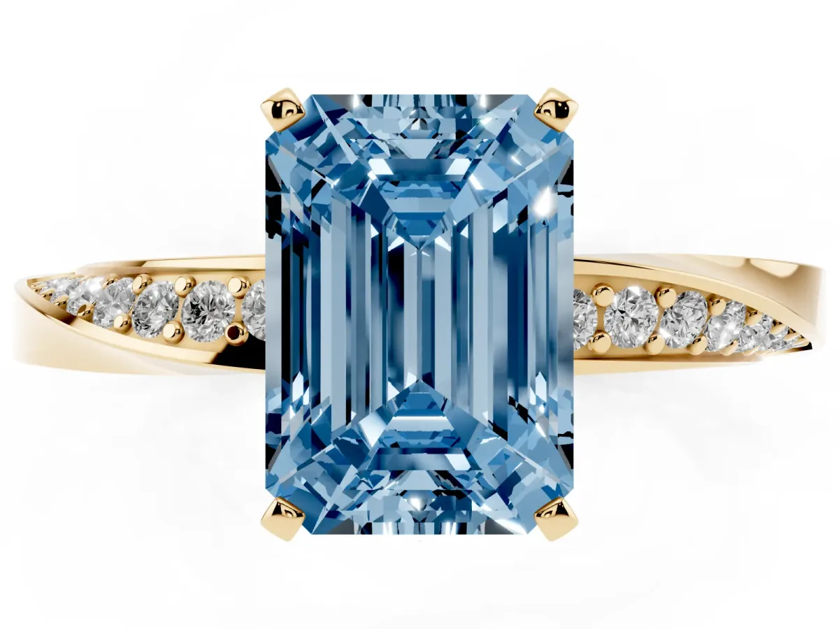 Fancy Blue Emerald Cut Diamond Engagement Ring with Side Stone Accents and Four-Prong Setting Yellow gold