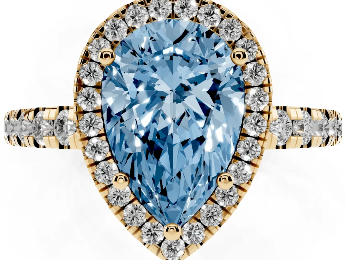 Fancy Blue Pear Cut Diamond Halo Ring with Pavé Band and Four-Prong Setting Yellow gold