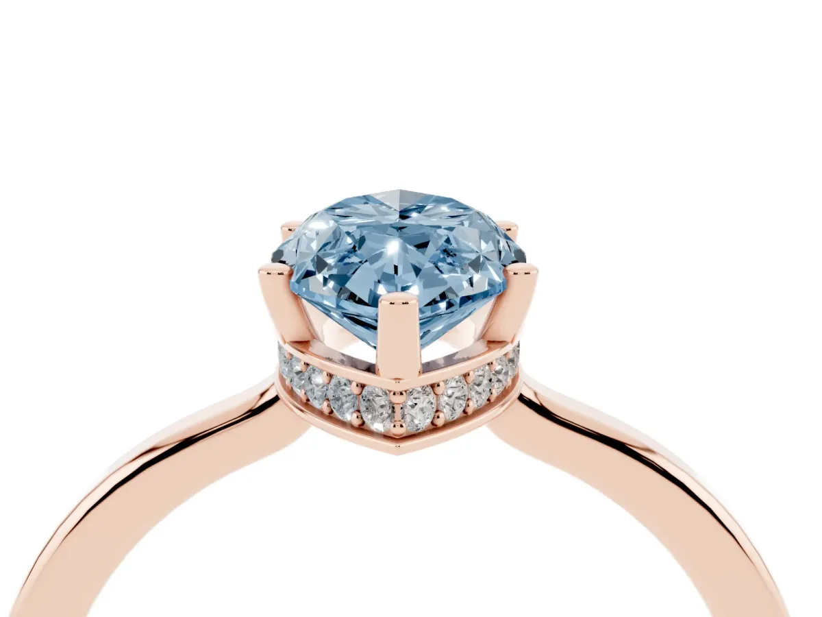 Fancy Blue Marquise Cut Cut Solitaire Engagement Ring with Four-Prong Setting on a Classic Band Rose gold