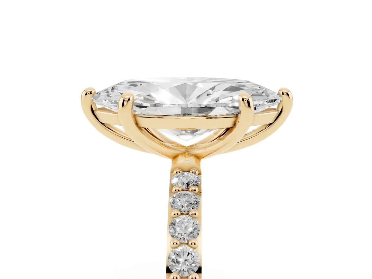 Marquise Cut Diamond Solitaire Ring with Round Pavé Band and Prong Setting Yellow gold