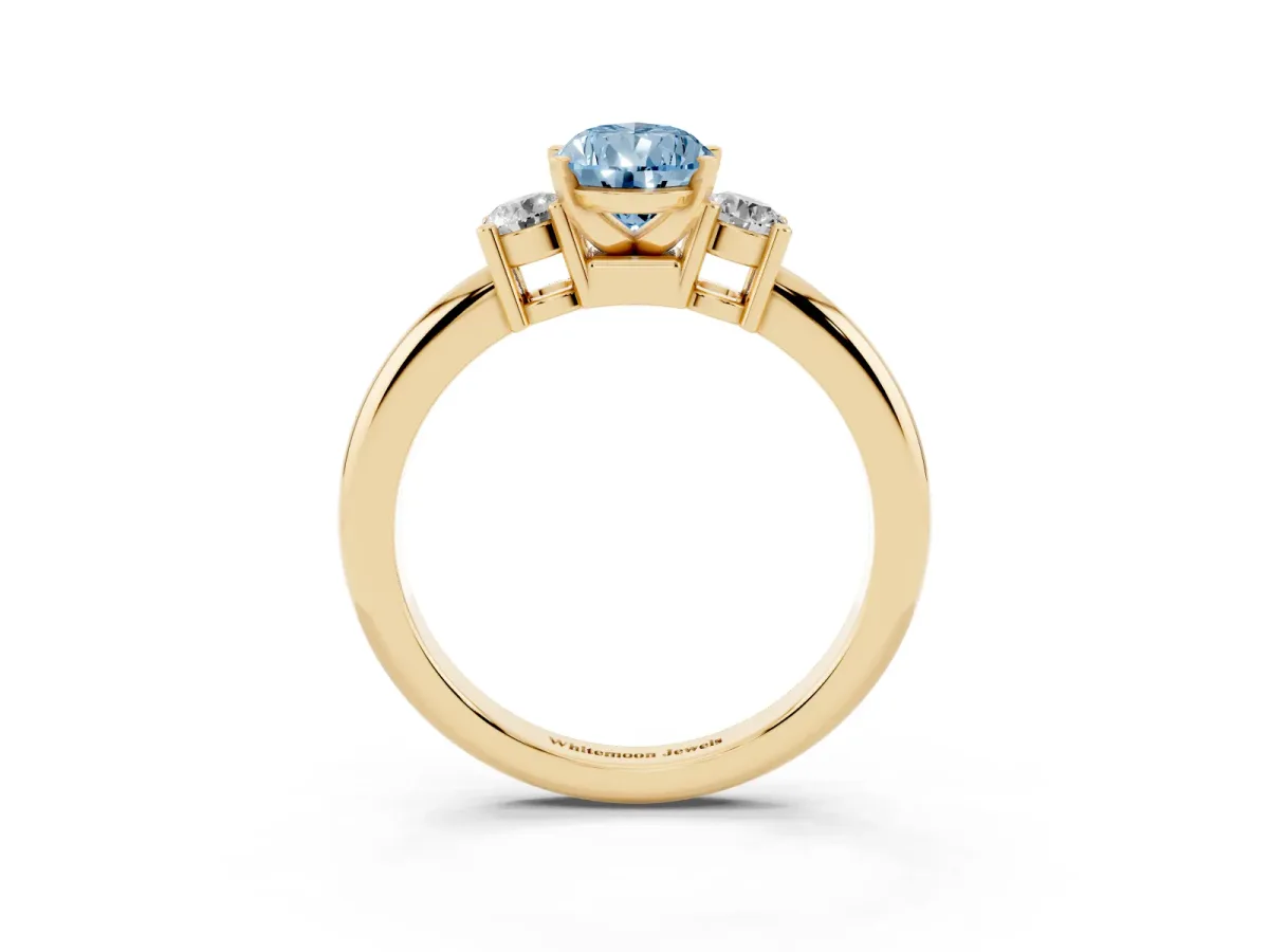 Fancy Blue Three-Stone Pear Cut Cut Diamond Solitaire with Prong Setting and Classic Band Yellow gold