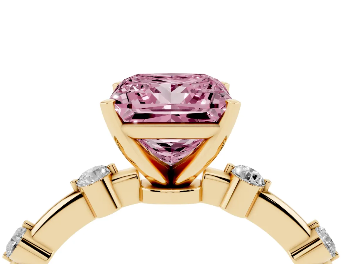 Fancy Pink Princess Cut Solitaire Diamond Ring with Bezel Set Side Stones and Prong Setting Yellow gold