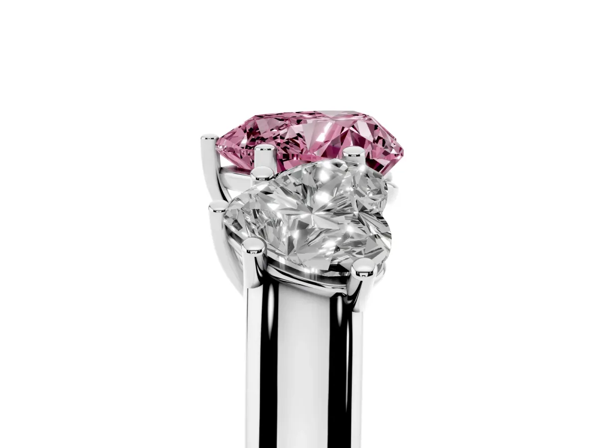 Fancy Pink Heart Cut Three-Stone Diamond Ring with Prong Setting on a Classic Band Silver