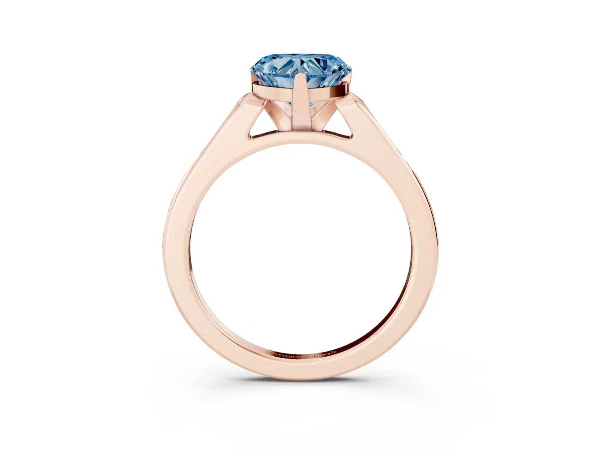 Fancy Blue Heart Cut Diamond Solitaire Ring with Channel Set Round Band and Prong Setting Rose gold