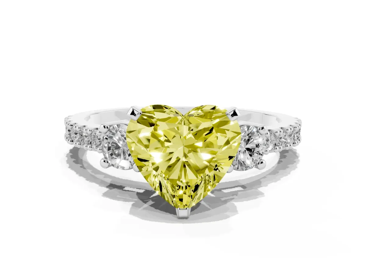Fancy Yellow Heart Cut Three-Stone Diamond Pavé Band with Prong Setting Platinum