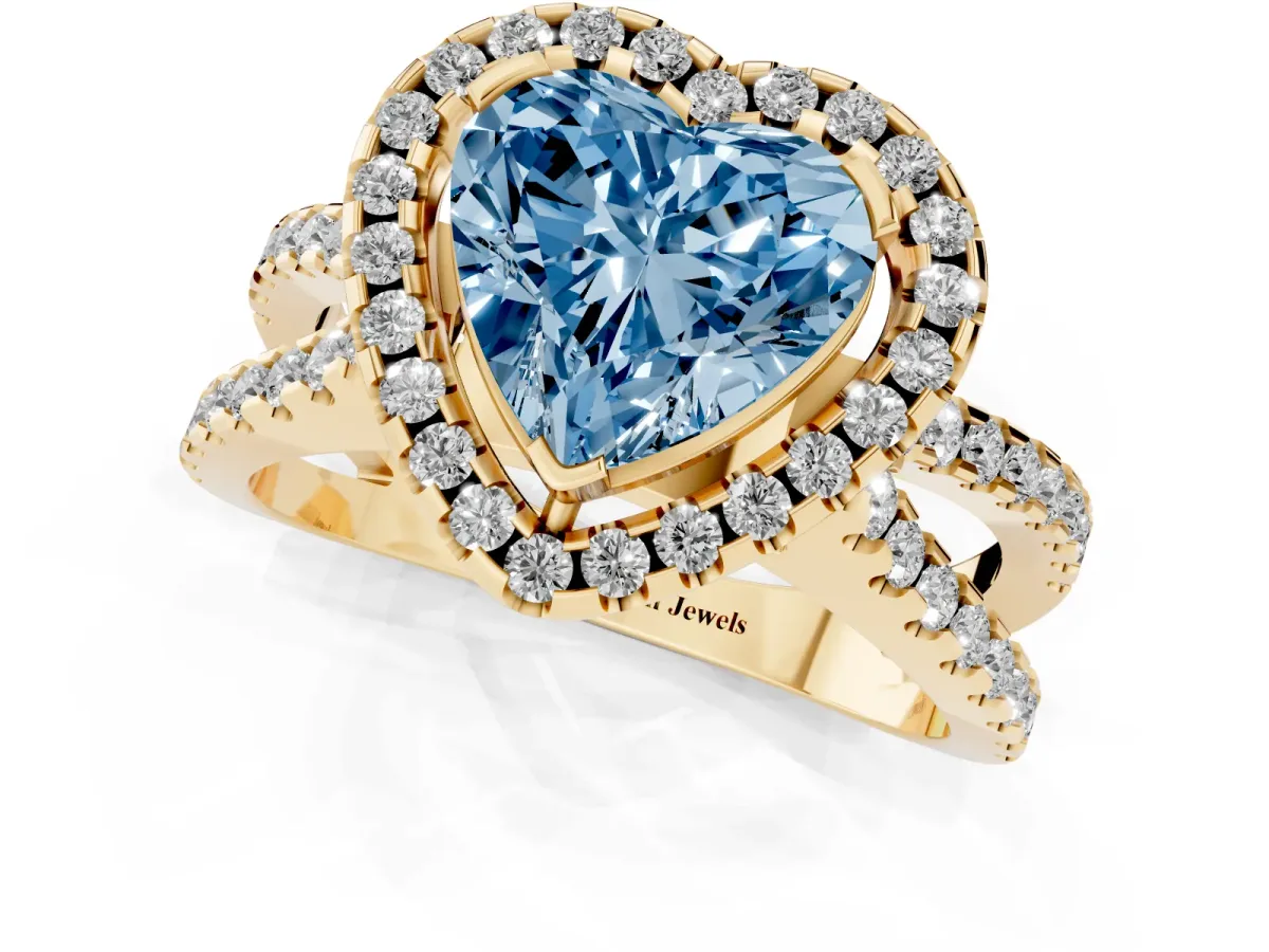 Fancy Blue Heart Cut Diamond Halo Ring with Split Shank Pavé Band and Prong Setting Yellow gold