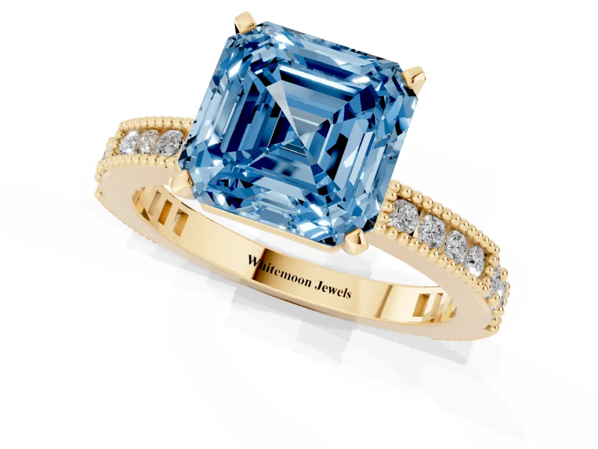 Fancy Blue Asscher Cut Solitaire with Pavé Band and Four-Prong Setting Yellow gold