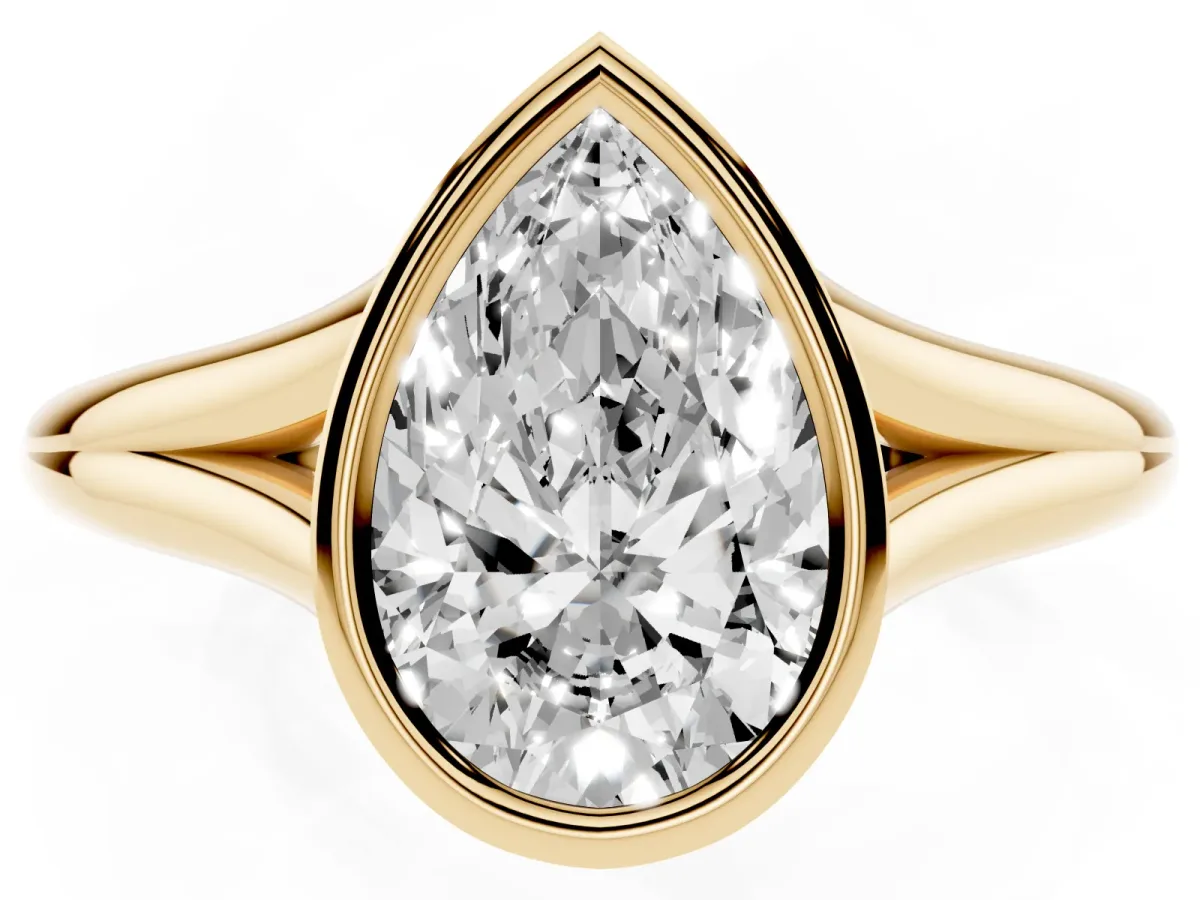 Bezel Set Pear Cut Cut Solitaire Ring with Tapered Band Yellow gold