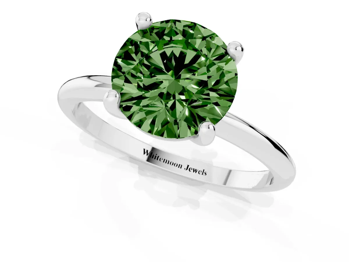 Fancy Green Round Cut Solitaire Diamond Ring with 4-Prong Setting on a Classic Band Silver
