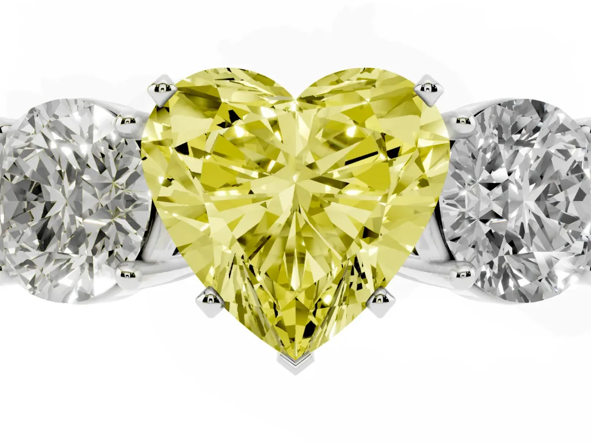 Fancy Yellow Three-Stone Heart Cut Diamond Ring with Round Side Stones, Classic Band, and Four-Prong Setting White gold