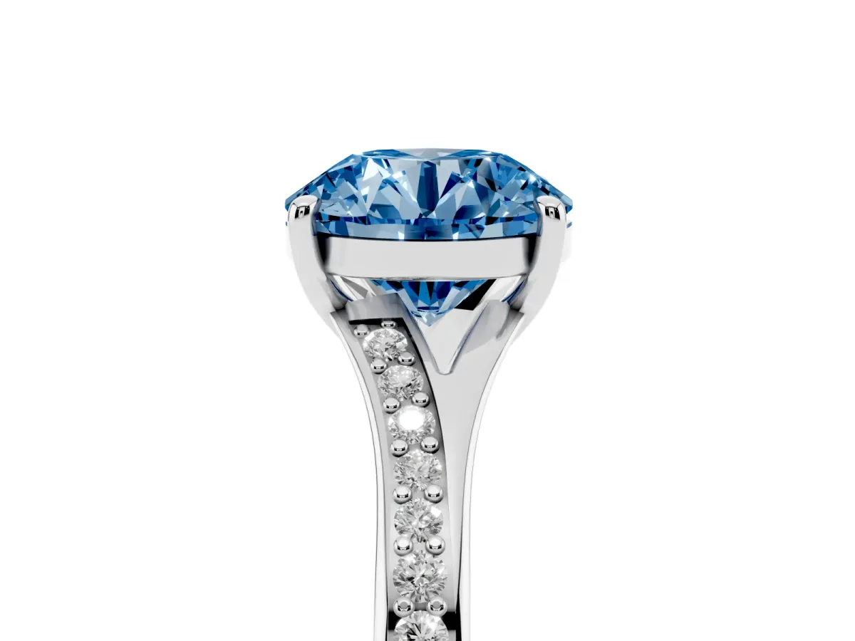 Fancy Blue Round Cut Diamond Solitaire Ring with Pavé Band and Prong Setting Silver