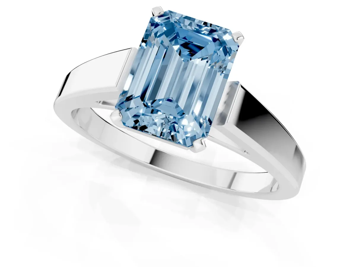 Fancy Blue Emerald Cut Solitaire Engagement Ring with Four-Prong Setting and Tapered Band Silver
