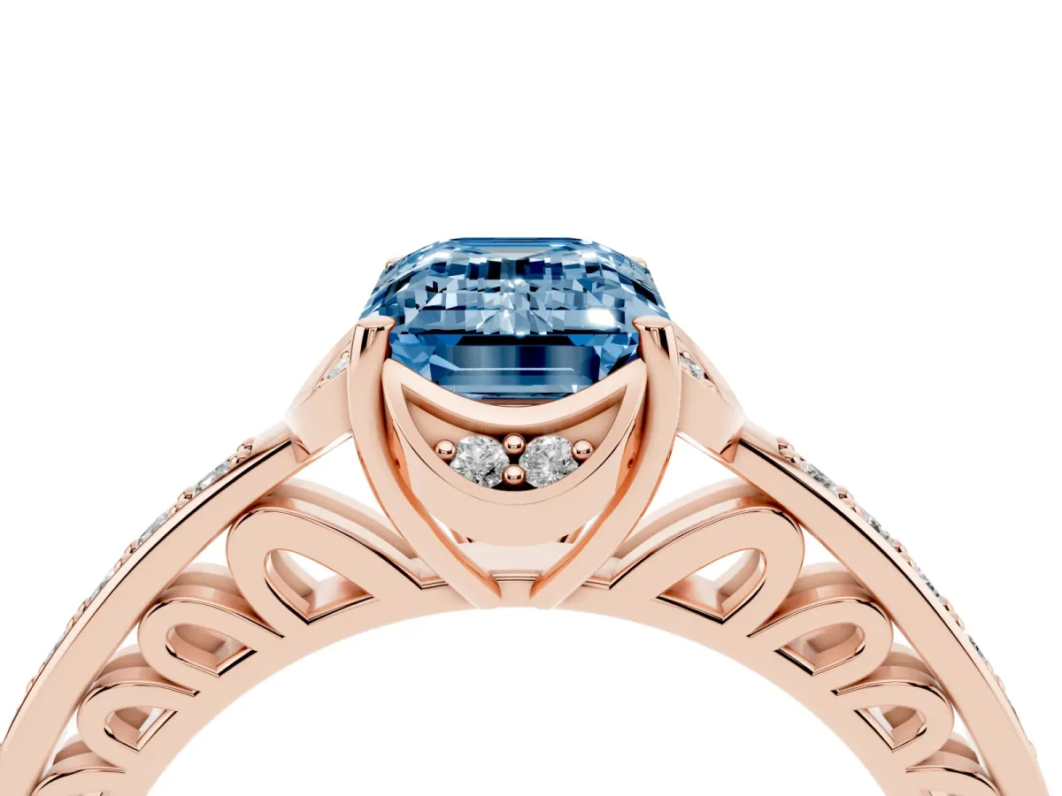 Fancy Blue Emerald Cut Cut Halo Diamond Ring with Channel Set Band and Four-Prong Setting Rose gold