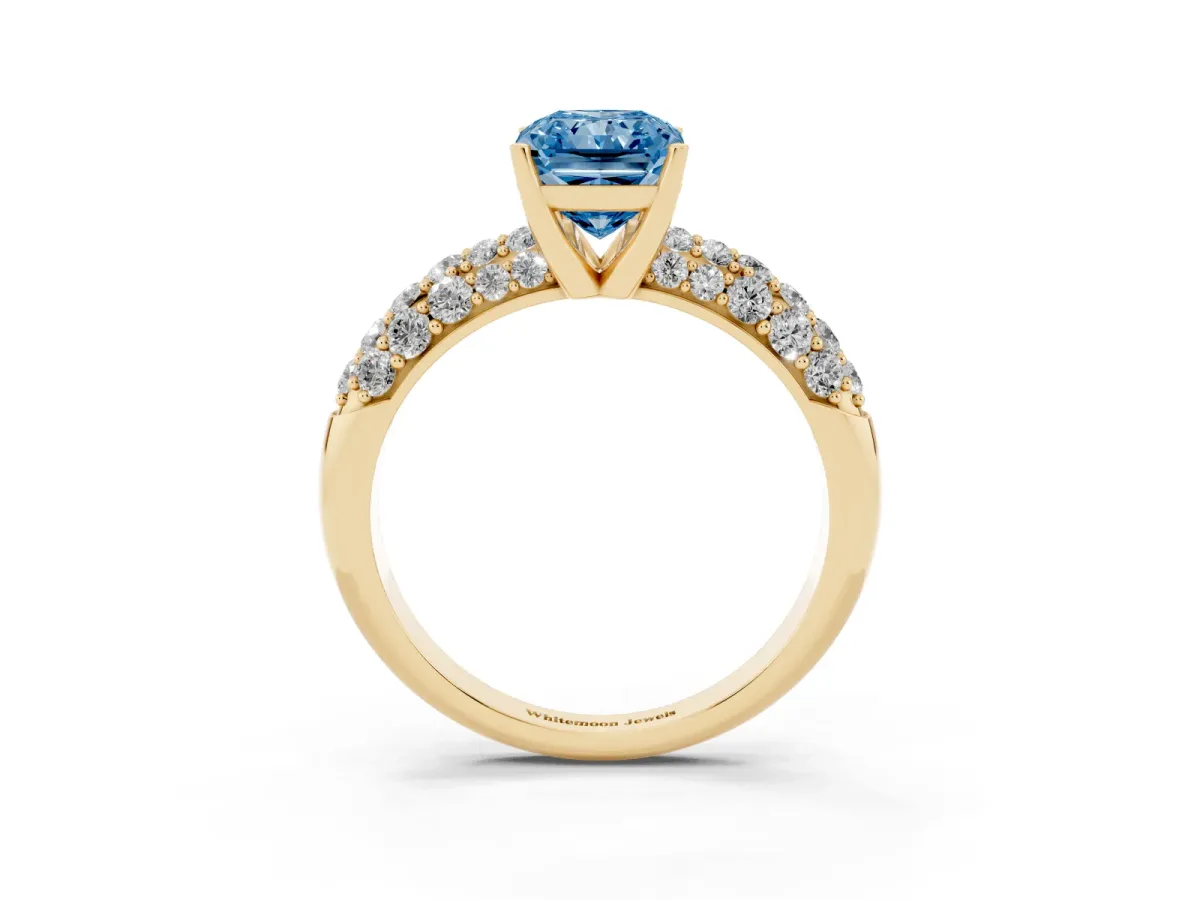 Fancy Blue Radiant Cut Diamond Pavé Band Solitaire Ring with Four-Prong Setting Yellow gold