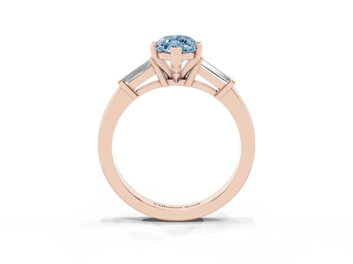 Fancy Blue Marquise Cut Cut Diamond Solitaire Ring with Tapered Baguette Accents and Four-Prong Setting Rose gold