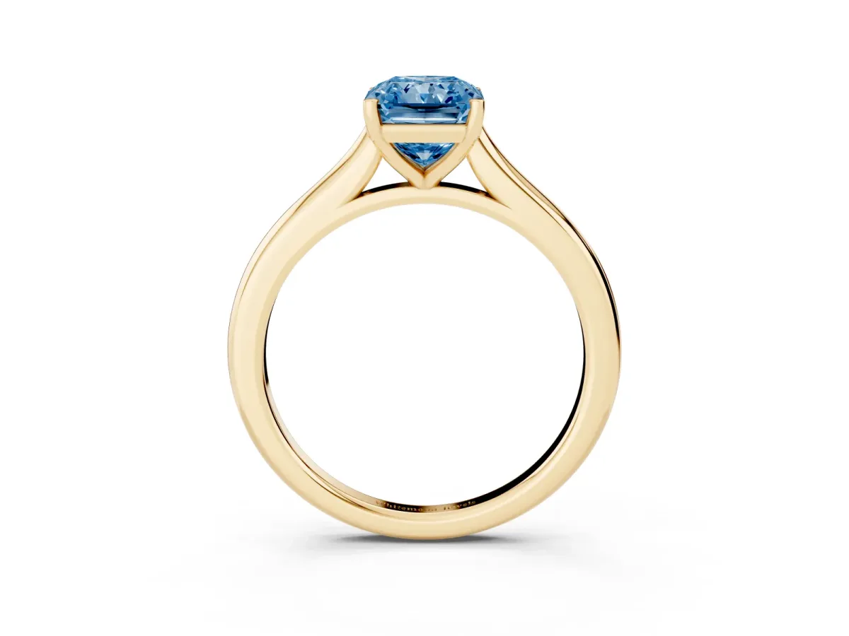 Fancy Blue Radiant Cut Cut Solitaire Ring with Cathedral Band and Four-Prong Setting Yellow gold