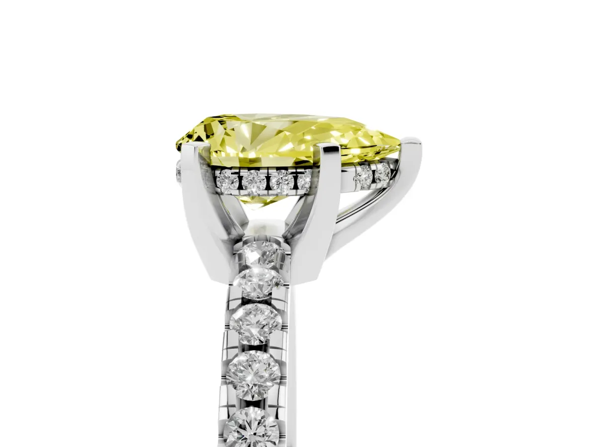 Fancy Yellow Pear Cut Diamond Solitaire Ring with Round Pavé Band and Four-Prong Setting Silver