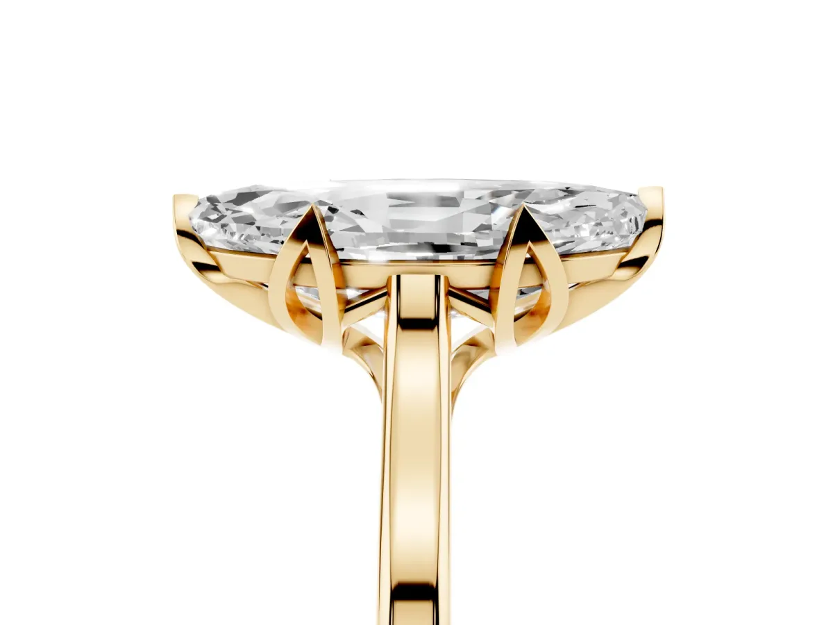 Marquise Cut Diamond Solitaire Ring with Flower Prong Setting and Classic Band Yellow gold