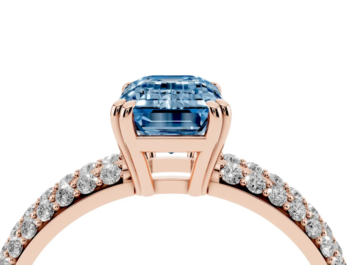 Fancy Blue Emerald Cut Diamond Solitaire Ring with Multi-Row Round Pavé Band and Prong Setting Rose gold