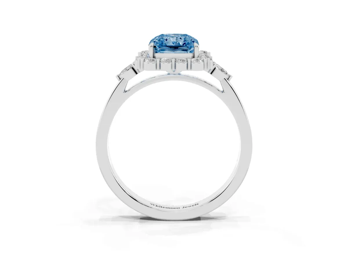 Fancy Blue Radiant Cut Diamond Halo Ring with Pear Side Stones and Prong Setting Silver