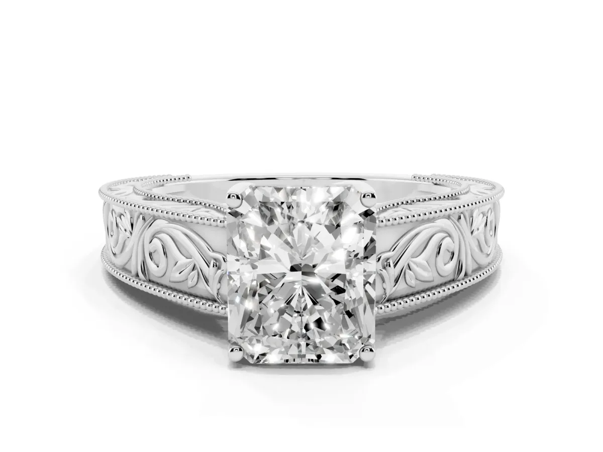 Radiant Cut Diamond Solitaire Ring with Engraved Band and Four-Prong Setting Platinum
