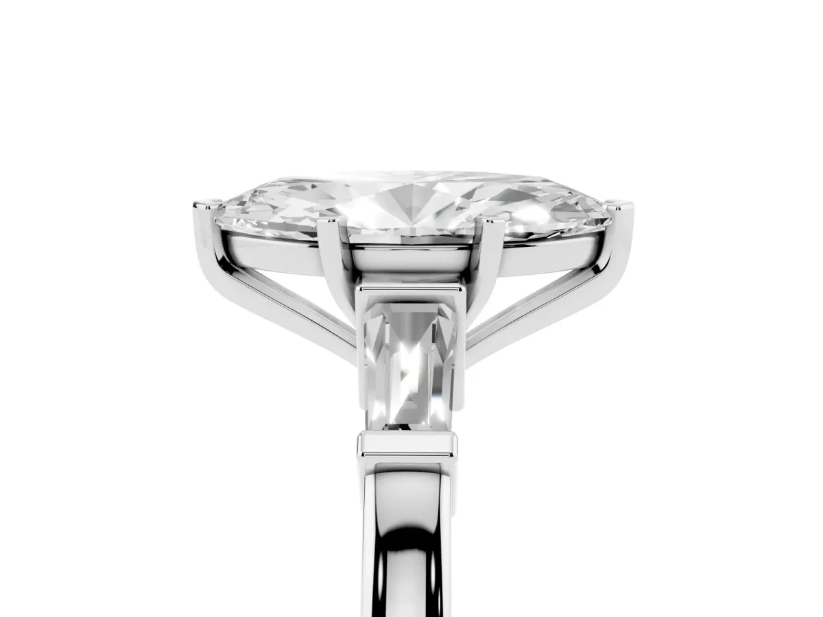 Marquise Cut Cut Diamond Solitaire Ring with Tapered Baguette Accents and Four-Prong Setting Platinum