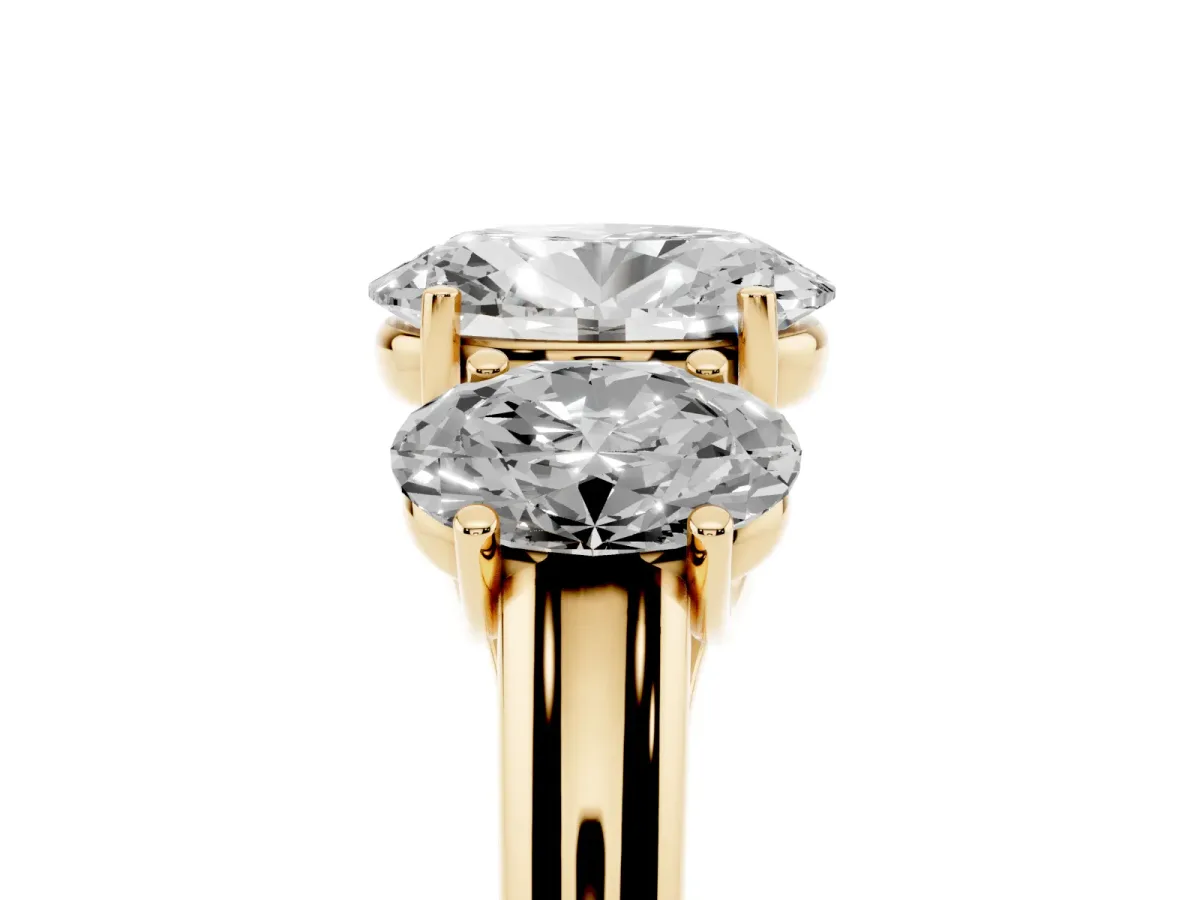 Three-Stone Oval Cut Diamond Engagement Ring with Prong Setting Yellow gold