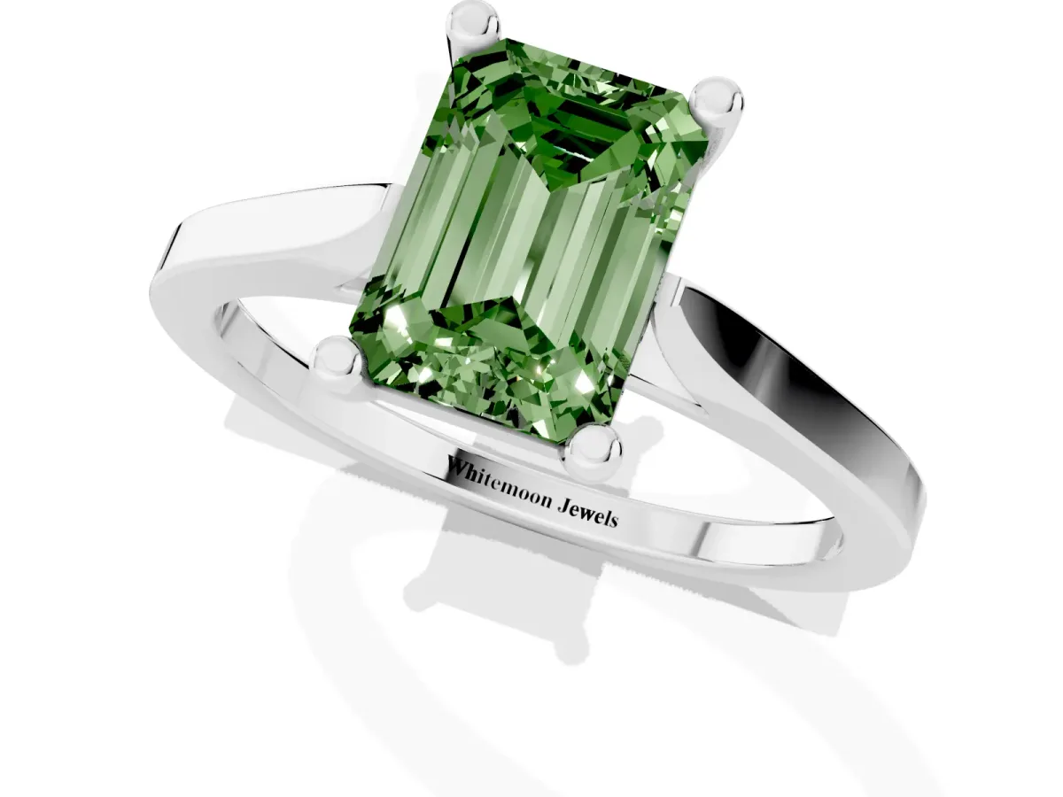 Fancy Green Emerald Cut Solitaire Diamond Ring with Four-Prong Setting and Tapered Band Silver