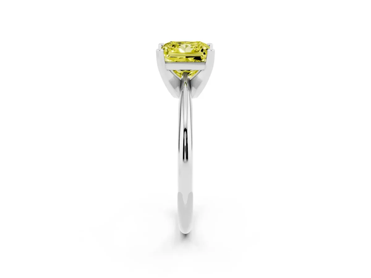 Fancy Yellow Princess Cut Cut Solitaire Ring with Four-Prong Setting on a Classic Band Silver