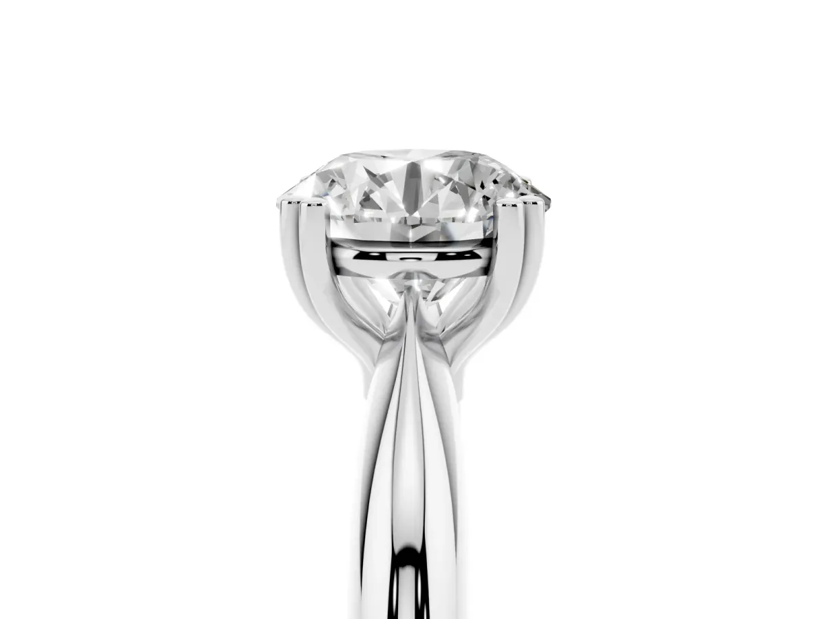 Round Cut Cut Solitaire Engagement Ring with Tapered Band and Four-Prong Setting Platinum