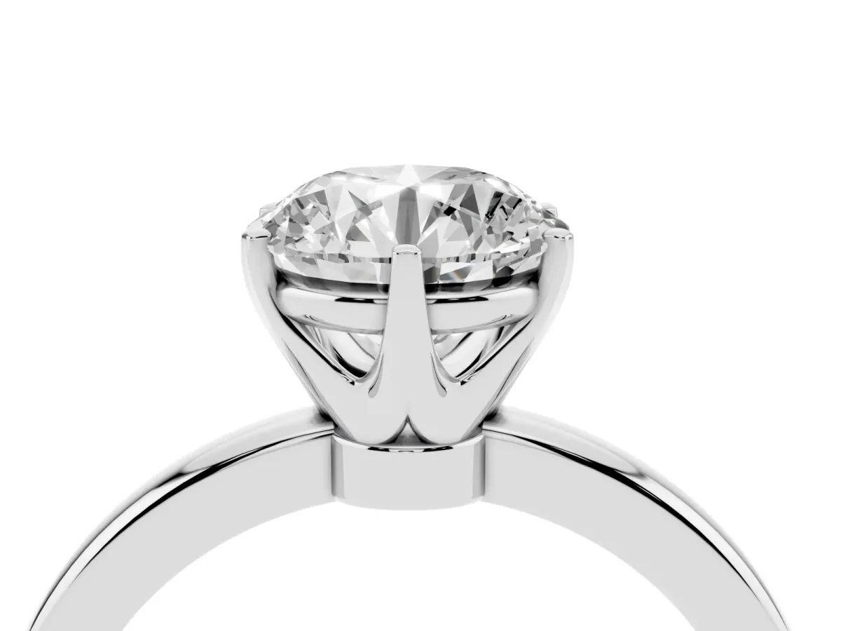 Round Cut Solitaire Diamond Ring with Six-Prong Setting on a Classic Band Silver