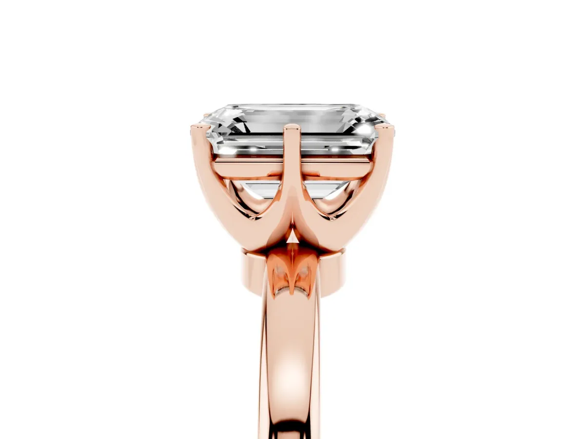 Emerald Cut Solitaire Diamond Ring with Six-Prong Setting on a Classic Band Rose gold