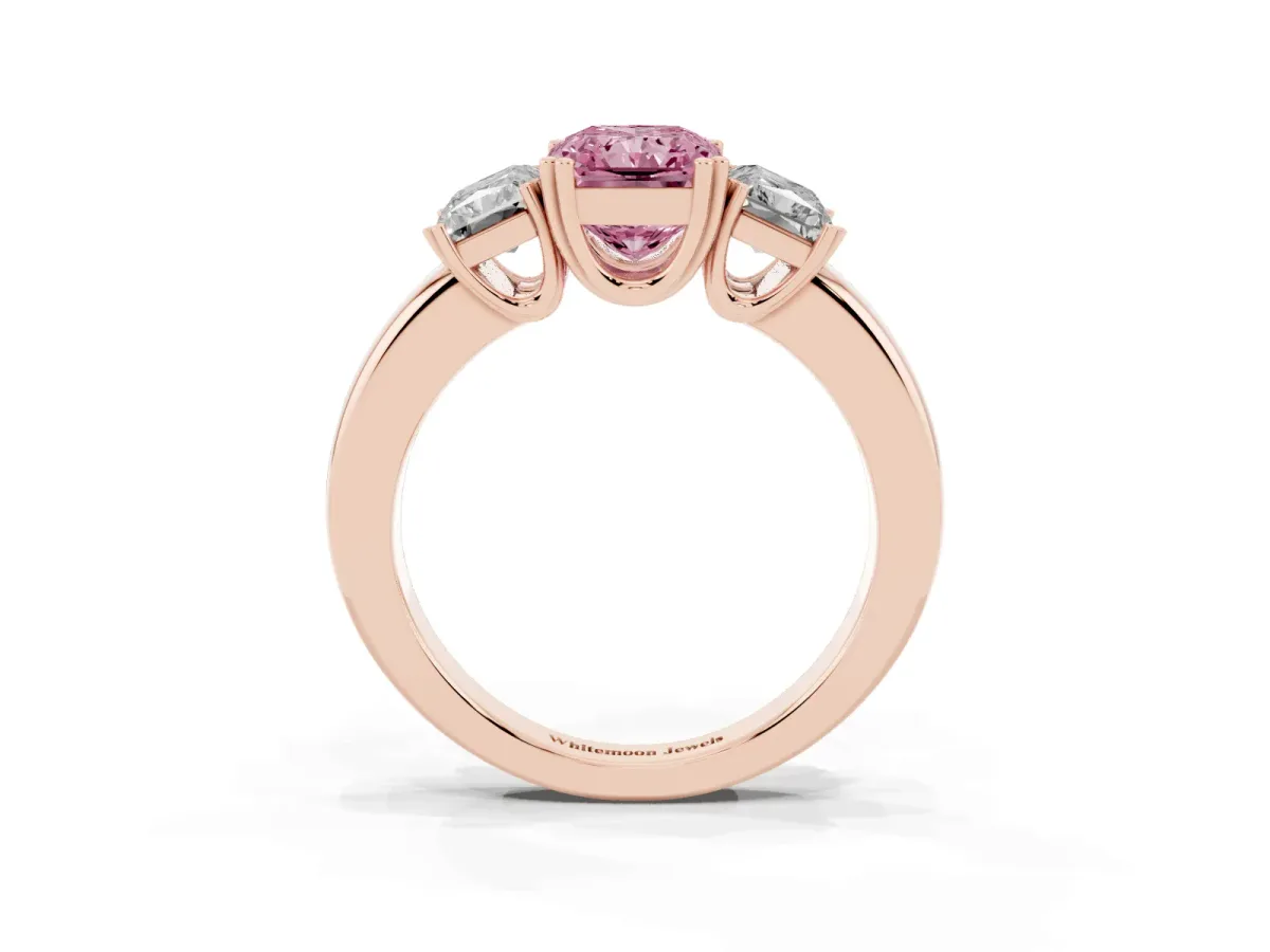 Fancy Pink Three-Stone Radiant Cut Cut Diamond Ring with Channel Set Band and Four-Prong Setting Rose gold