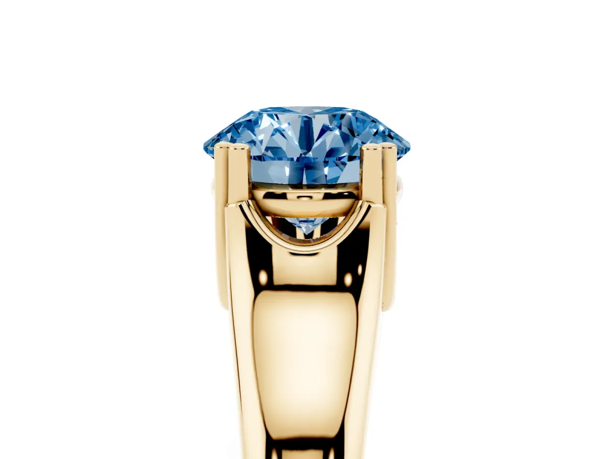 Fancy Blue Round Cut Diamond Solitaire Ring with Wide Band and Prong Setting Yellow gold