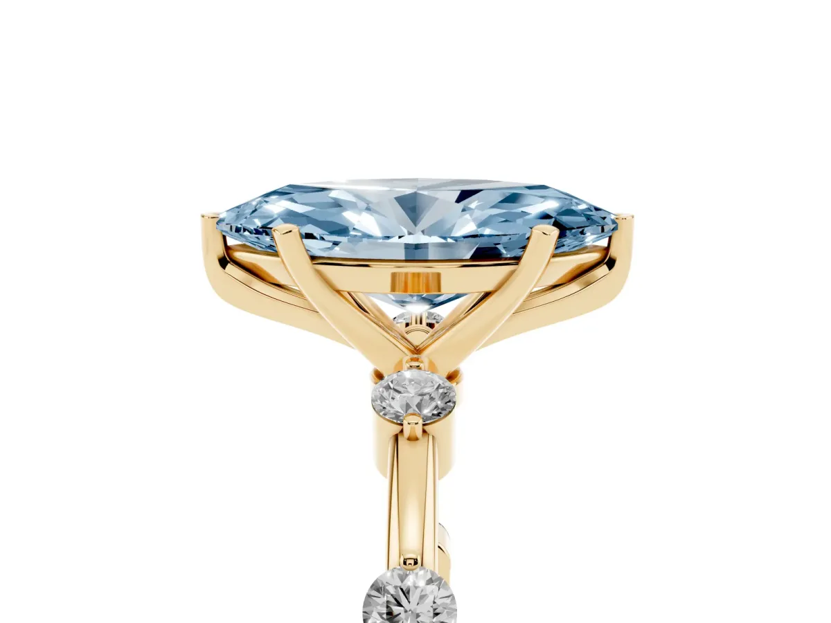 Fancy Blue Marquise Cut Solitaire Diamond Ring with Bezel Set Side Stones and Prong Setting Yellow gold