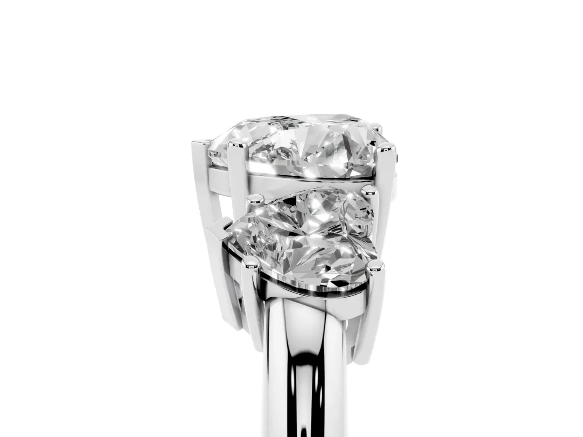 Three-Stone Heart Cut Cut Diamond Engagement Ring with Prong Setting on a White Gold Band Silver