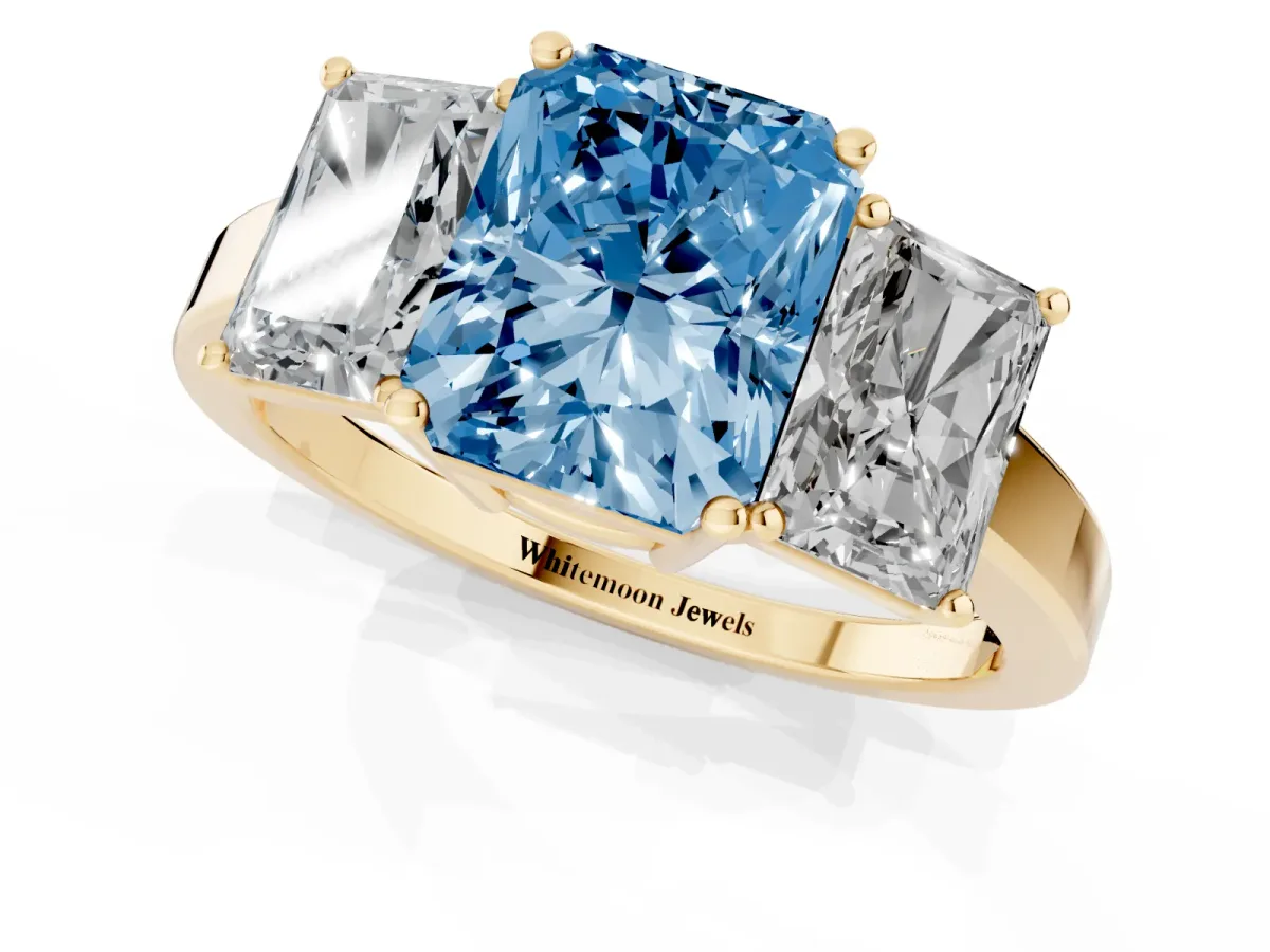 Fancy Blue Three-Stone Radiant Cut Cut Diamond Engagement Ring with Flat Band and Four-Prong Setting Yellow gold
