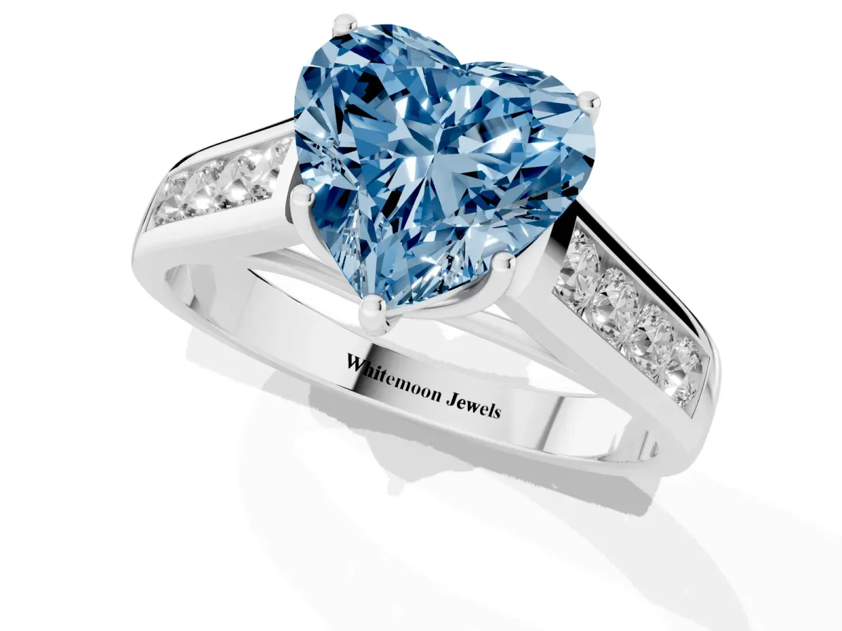 Fancy Blue Heart Cut Brilliant Channel-Set Solitaire Ring with Four-Prong Setting Silver