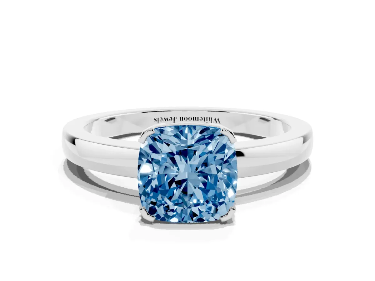 Fancy Blue Cushion Cut Cut Solitaire Ring with Four-Prong Setting and Classic Band Platinum