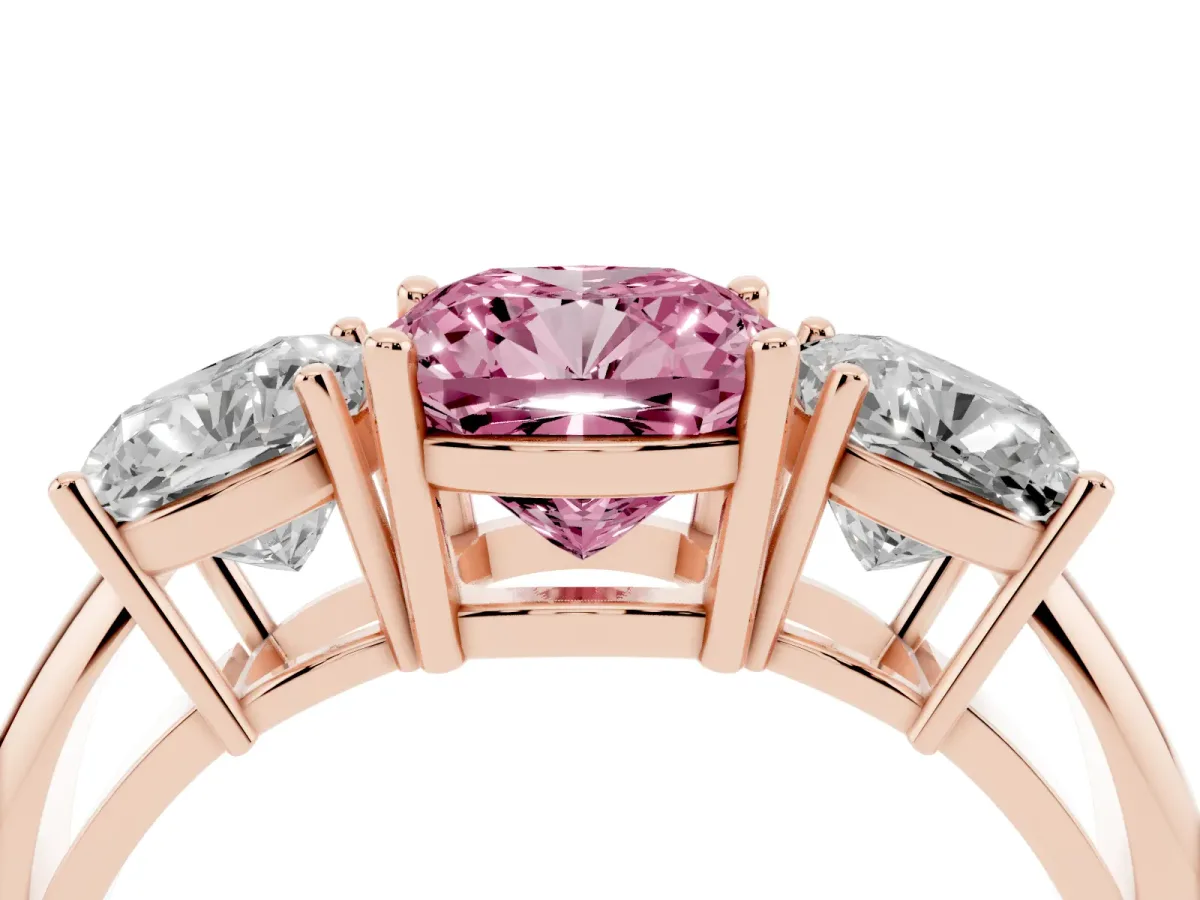 Fancy Pink Three-Stone Cushion Cut Cut Diamond Engagement Ring with Prong Setting on a White Gold Band Rose gold