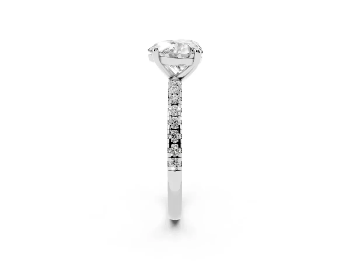 Heart Cut Diamond Brilliant Solitaire Ring with Pavé Band and Four-Prong Setting Silver