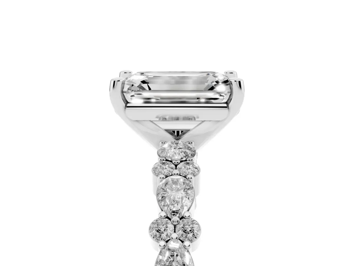 Emerald Cut Diamond Side Stone Solitaire Ring with Round and Four-Prong Setting Silver