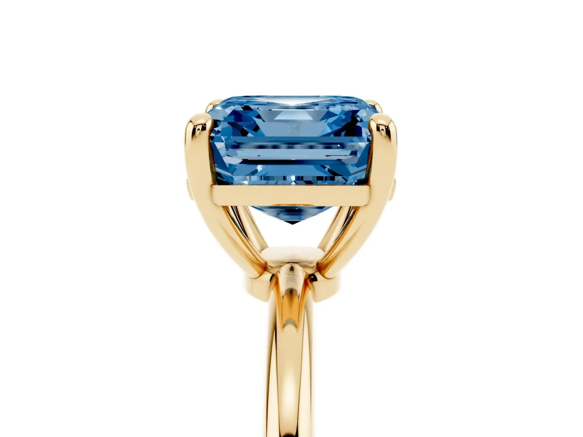 Fancy Blue Asscher Cut Solitaire Diamond Ring with 4-Prong Setting on a Classic Band Yellow gold