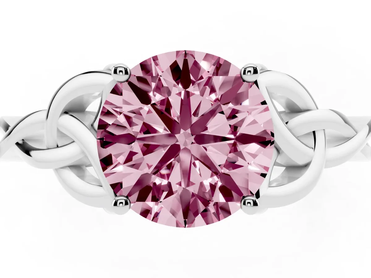 Fancy Pink Round Cut Diamond Solitaire Engagement Ring with Celtic Knot Band and Four-Prong Setting Silver