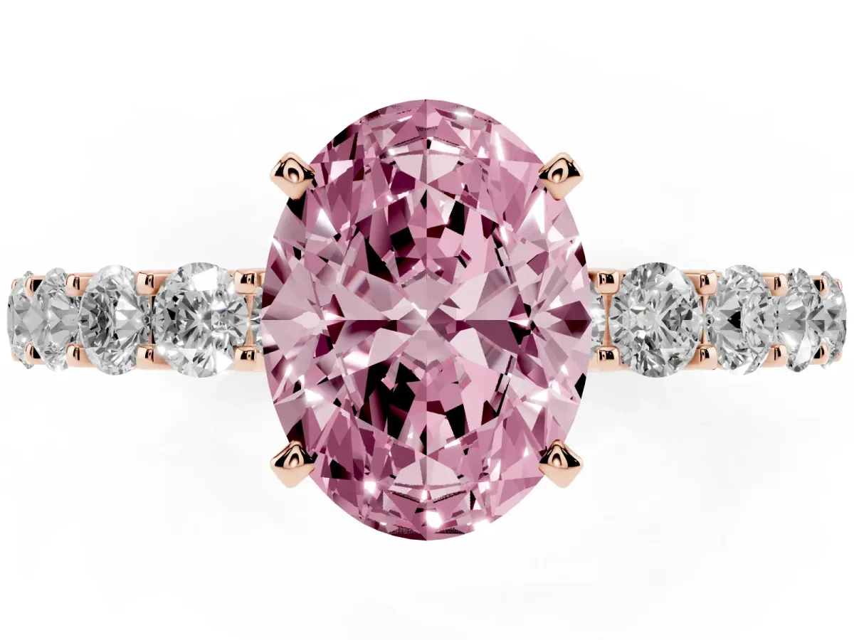 Fancy Pink Oval Cut Diamond Solitaire Ring with Shared Prong Pavé Band and Four-Prong Setting Rose gold