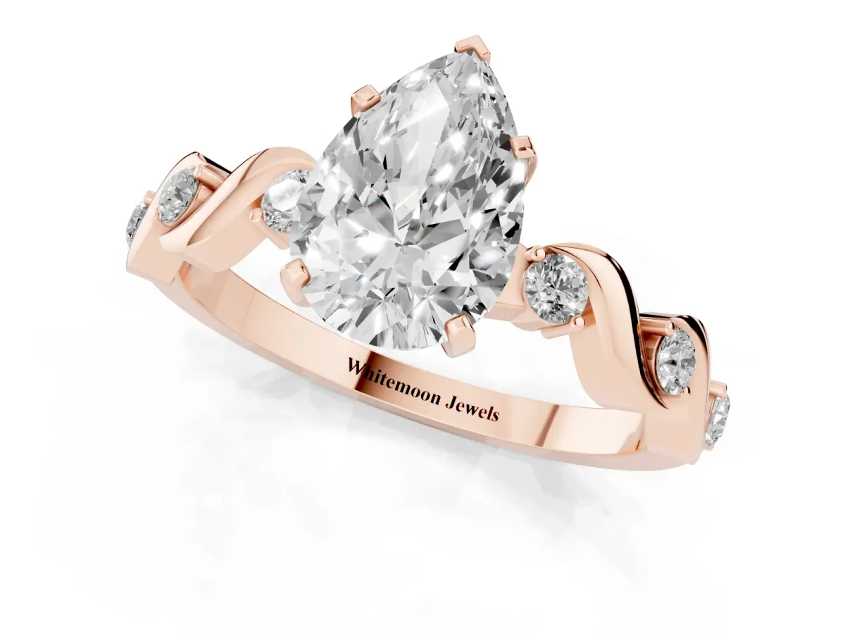 Pear Cut Diamond Solitaire Twisted Band with Round Accents and Prong Setting Rose gold