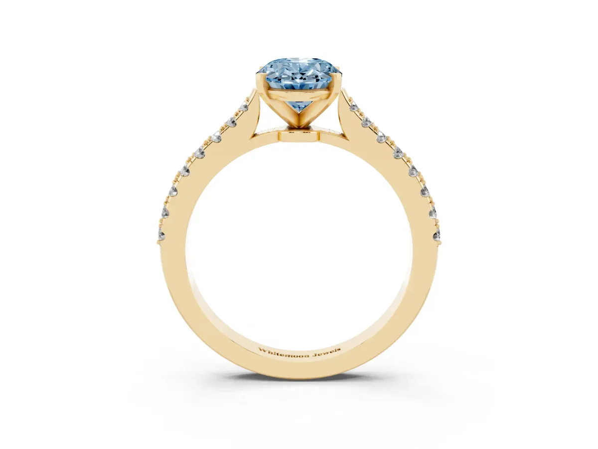 Fancy Blue Oval Cut Cut Solitaire Diamond Engagement Ring with Pave Band and Four-Prong Setting Yellow gold