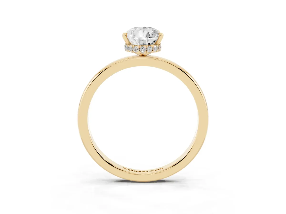 Pear Cut Solitaire Engagement Ring with Cathedral Band and Four-Prong Setting Yellow gold