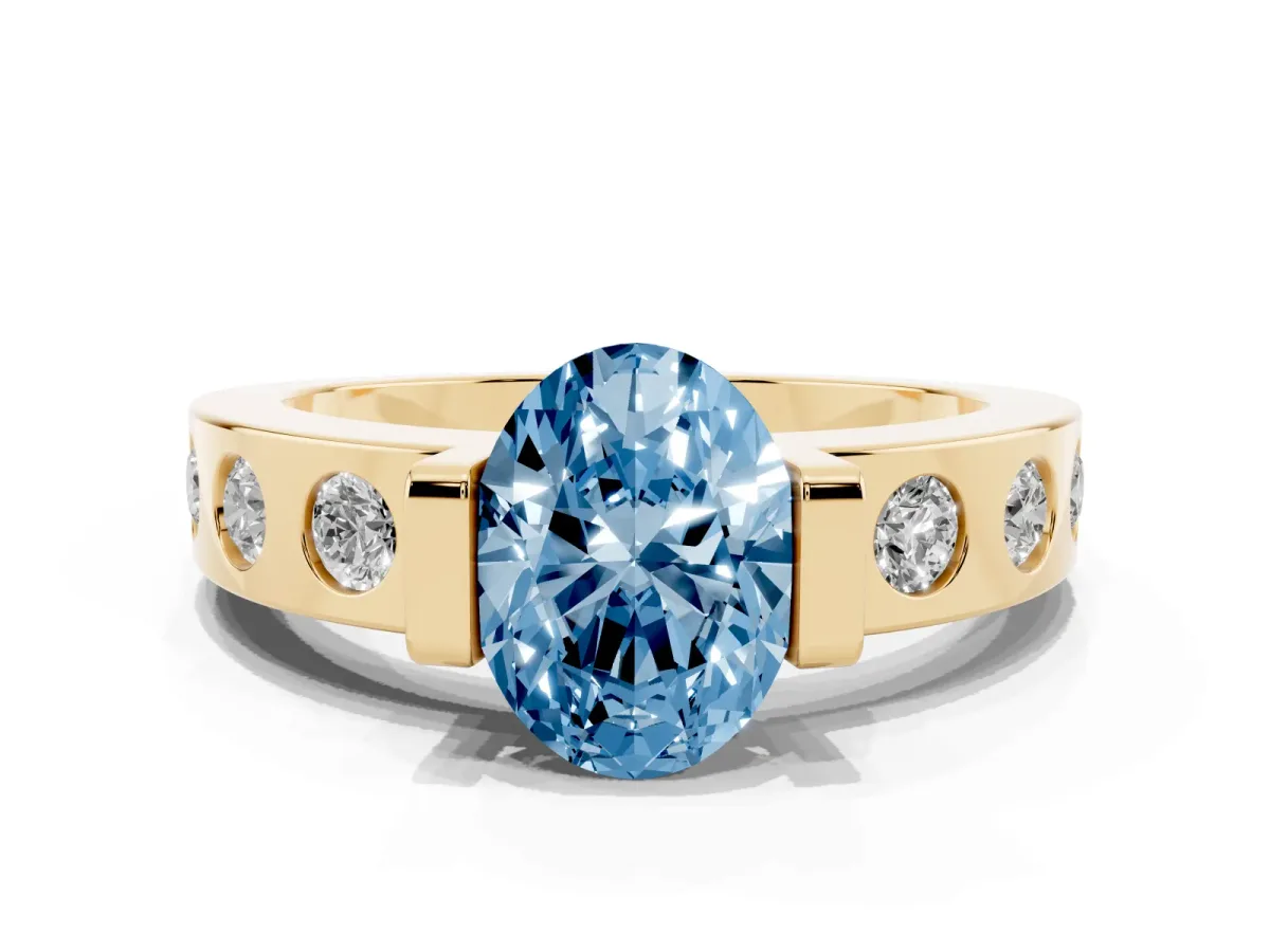 Fancy Blue Oval Cut Brilliant Channel-Set Diamond Ring with Bezel Prong Setting Yellow gold